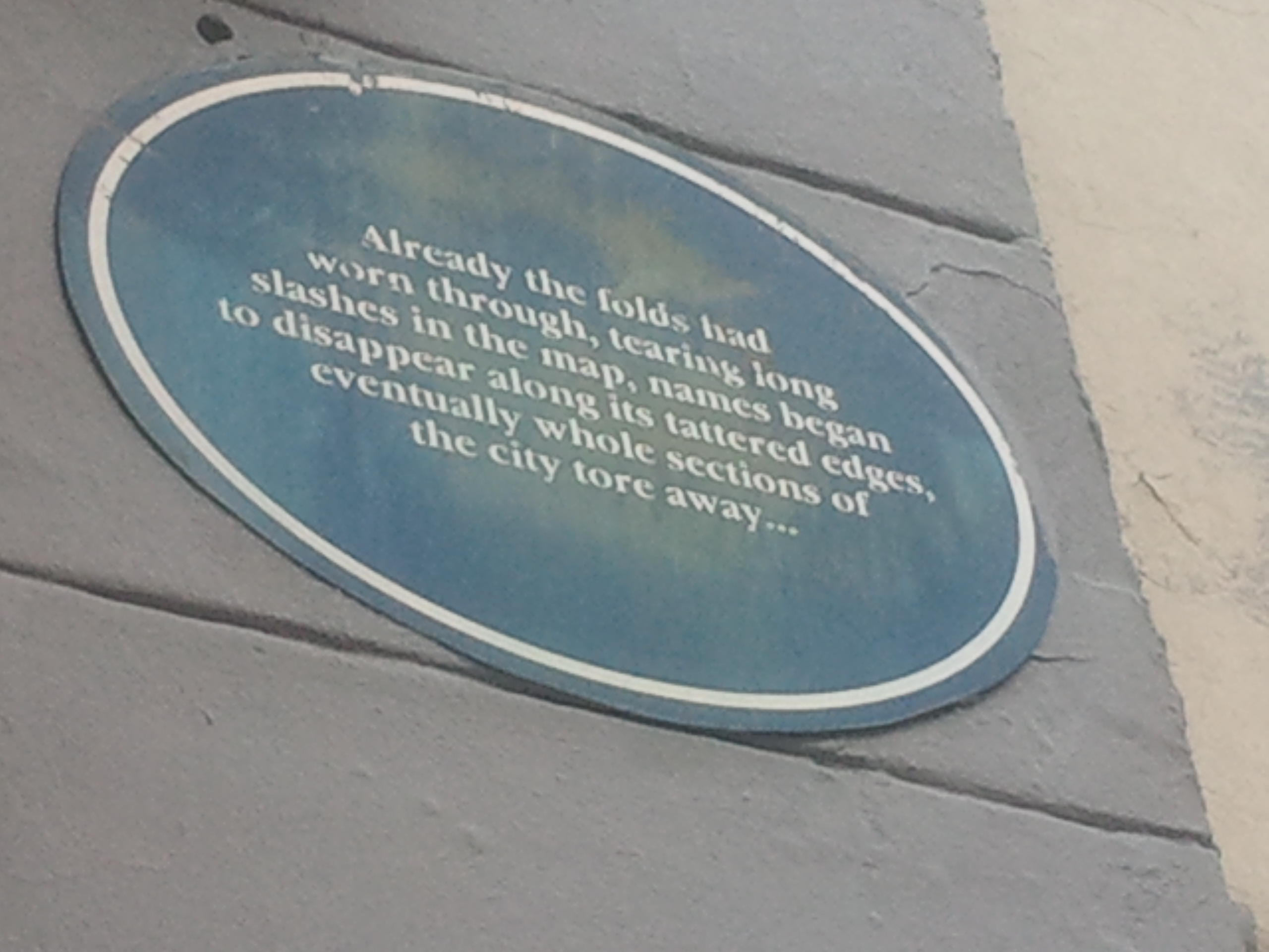 "Already the folds had worn through, tearing long slashes in the map, names began to disappear along its tattered edges, eventually whole sections of the city tore away..."