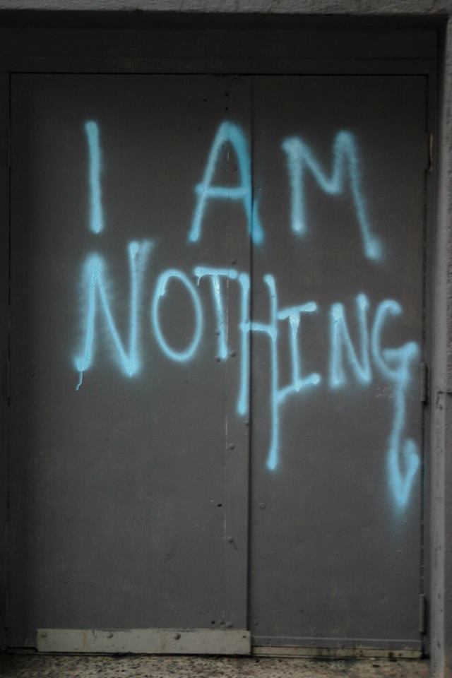 "i am nothing" in blue spraypaint